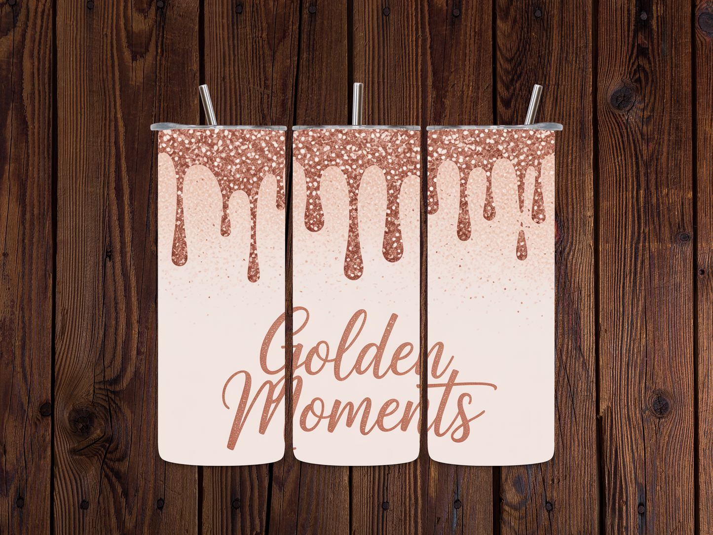 Rose Gold Dripping Glitter tumbler wrap with 'Golden Moments' text and rose gold glittery design on a wooden background