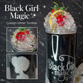 Black Girl Magic custom glitter tumbler with decorative lid on a dark background