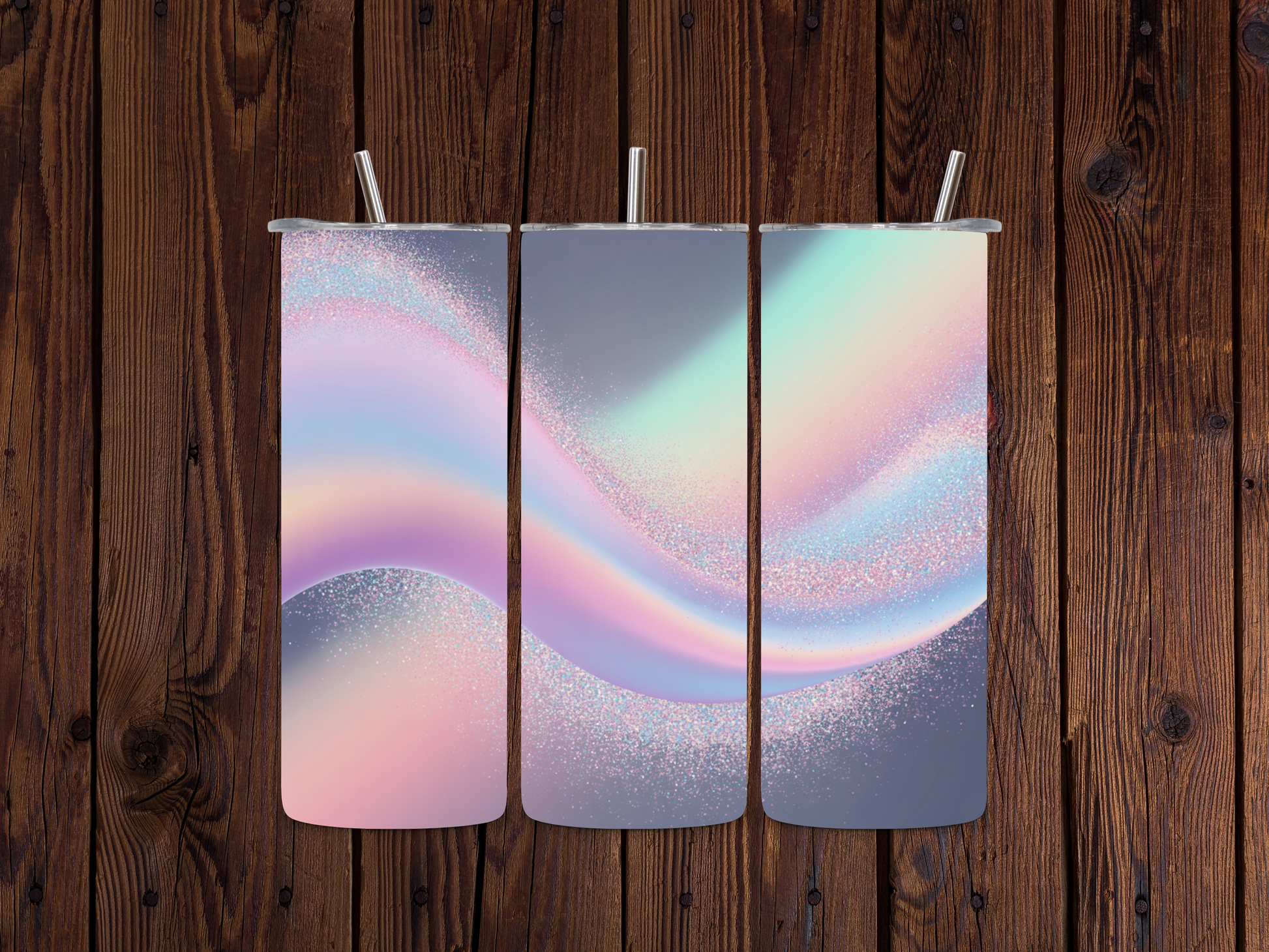 Three colorful Holographic Chunky Glitter Wrap tumblers with a wavy design on a wooden surface