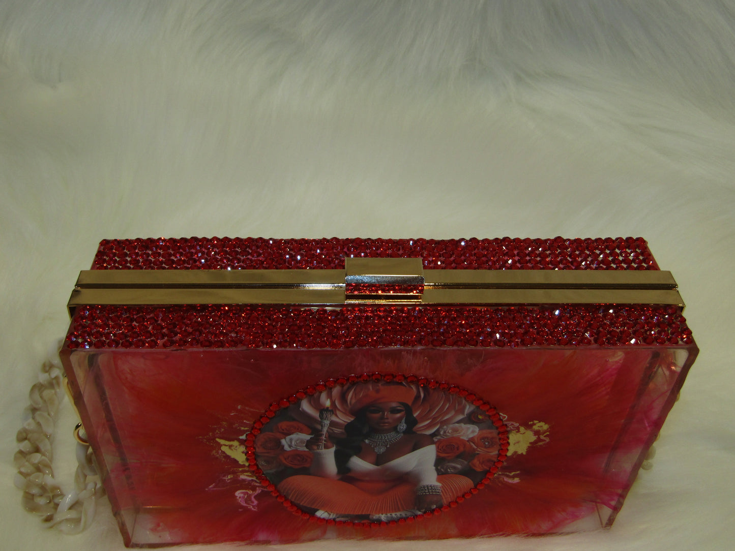 Glamorous Ruby Resin Clutch with Sparkling Rhinestones