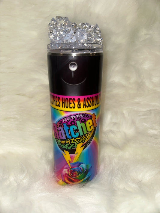 Ratchet Spray Tumbler with colorful design and text on a white fluffy background