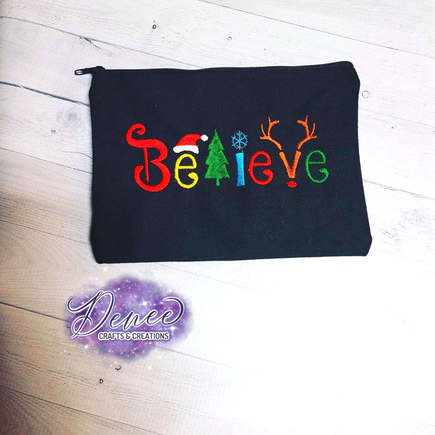 Embroidered BELIEVE zipper pouch